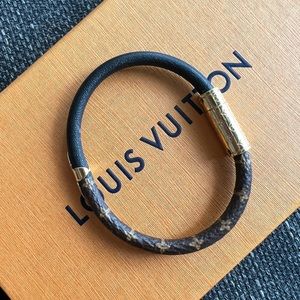 Authentic Louis Vuitton split leather bracelet. Like new. Black / Brown / Gold